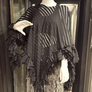 One of a kind poncho.